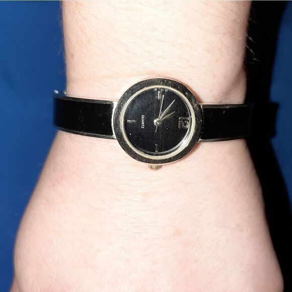 Black and silver hinged bangle watch main image 6